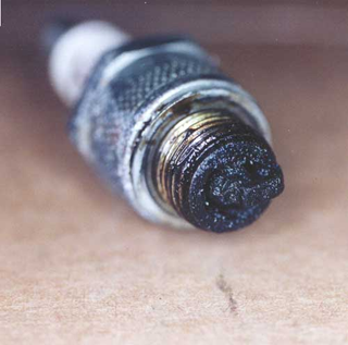 spark plug with carbon build up